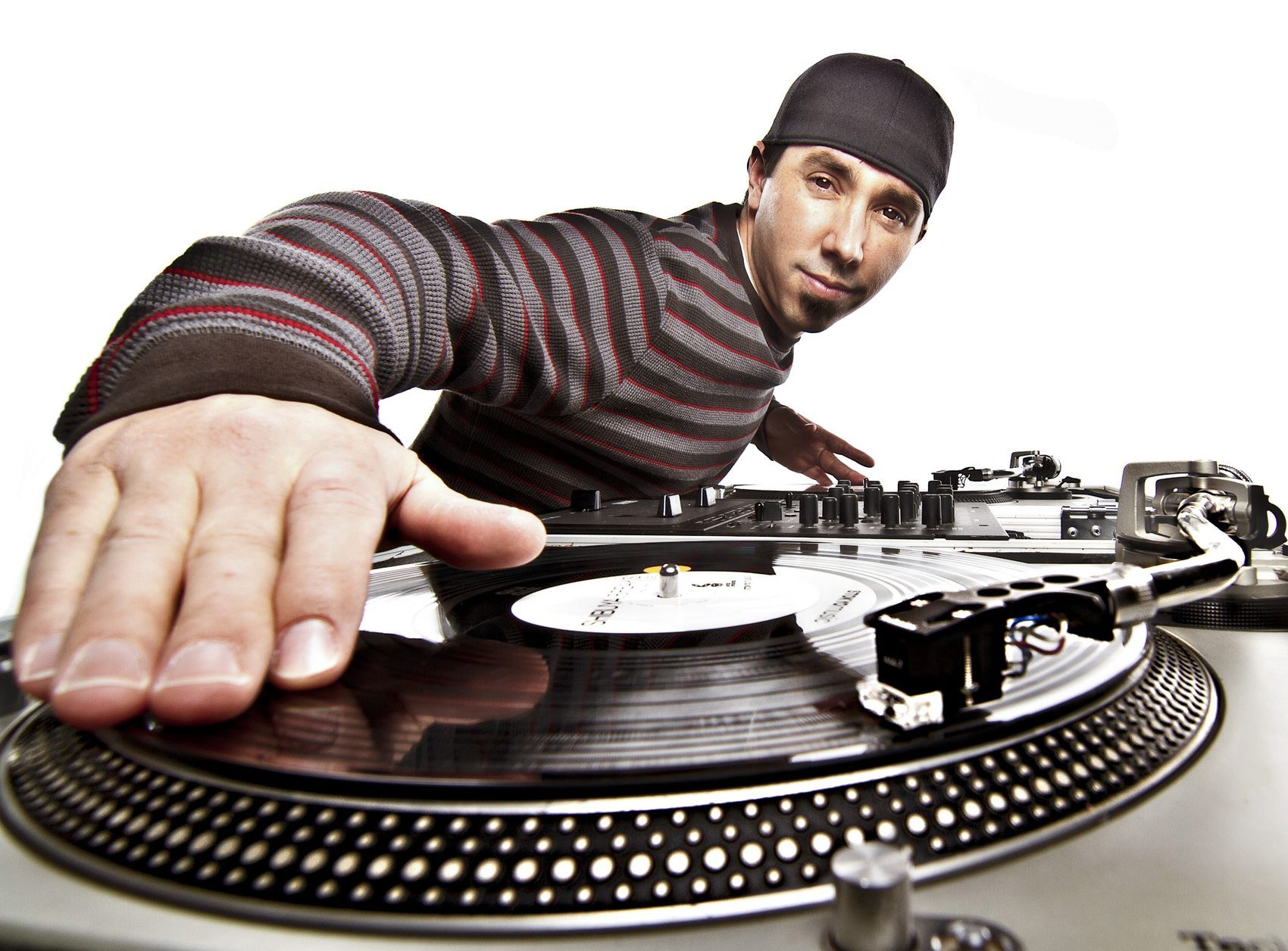 DJ working a turntable, overhead