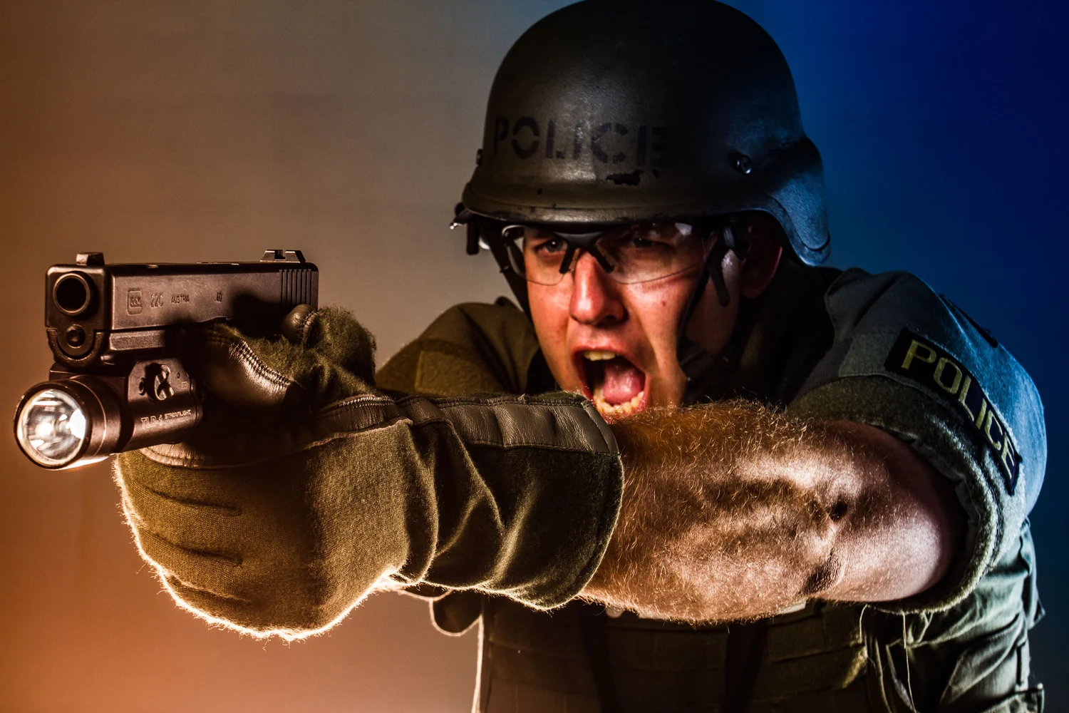 High-energy tactical campaign portrait in controlled studio light