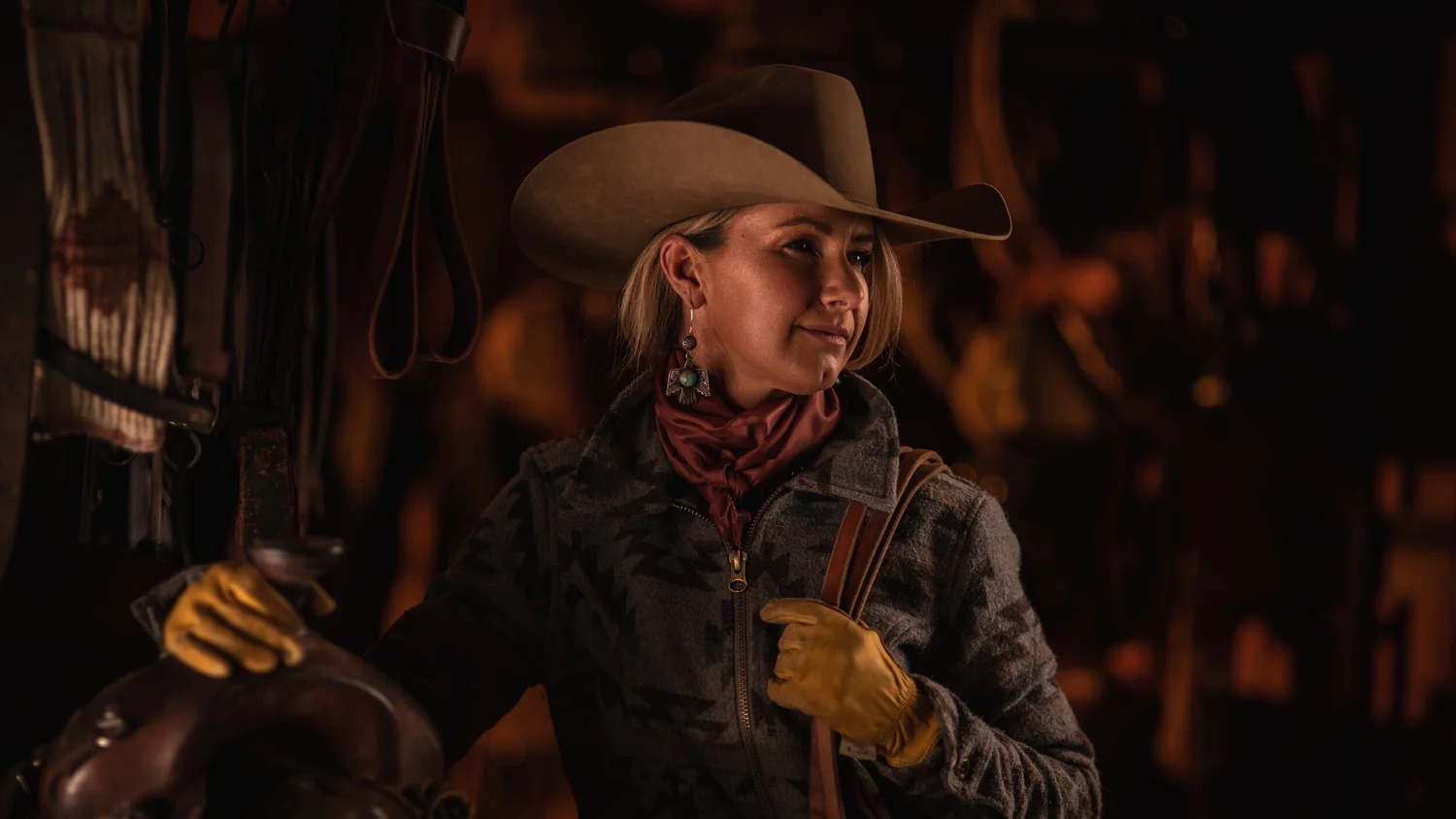 Western portrait inside a working tack room