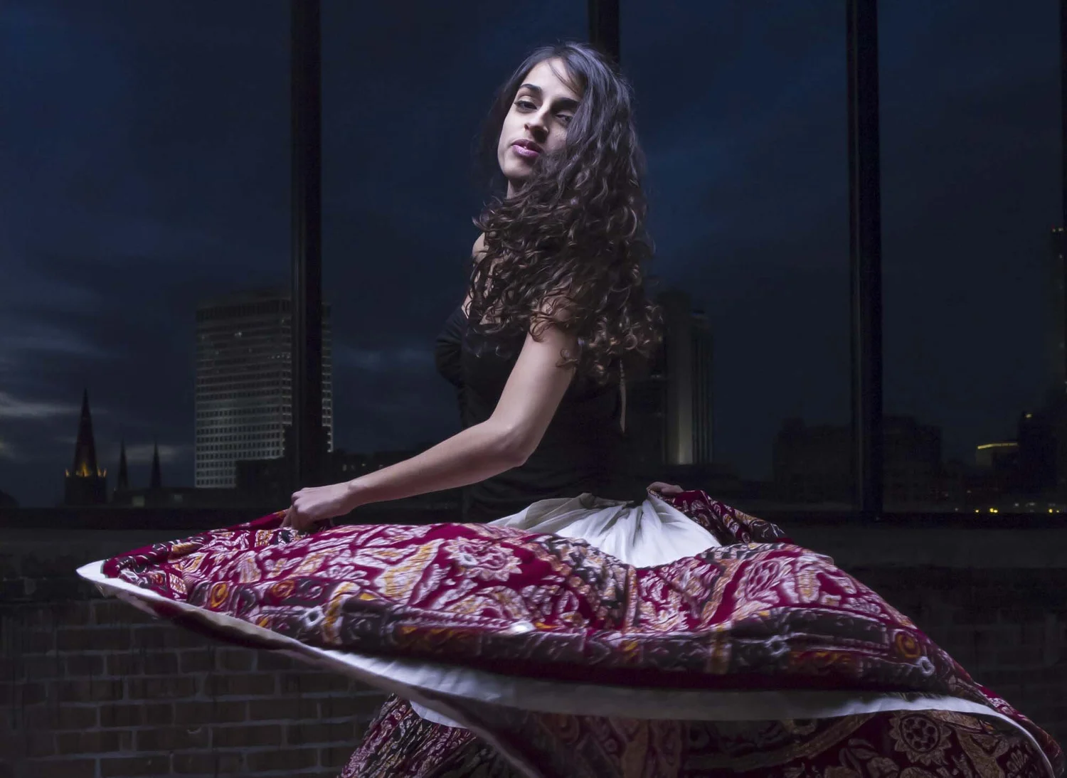 Editorial portrait with dramatic controlled lighting