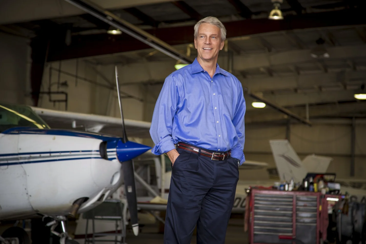 Environmental executive portrait in an aviation setting