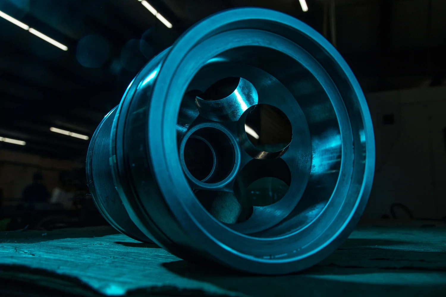 Machined industrial component photographed as graphic product detail