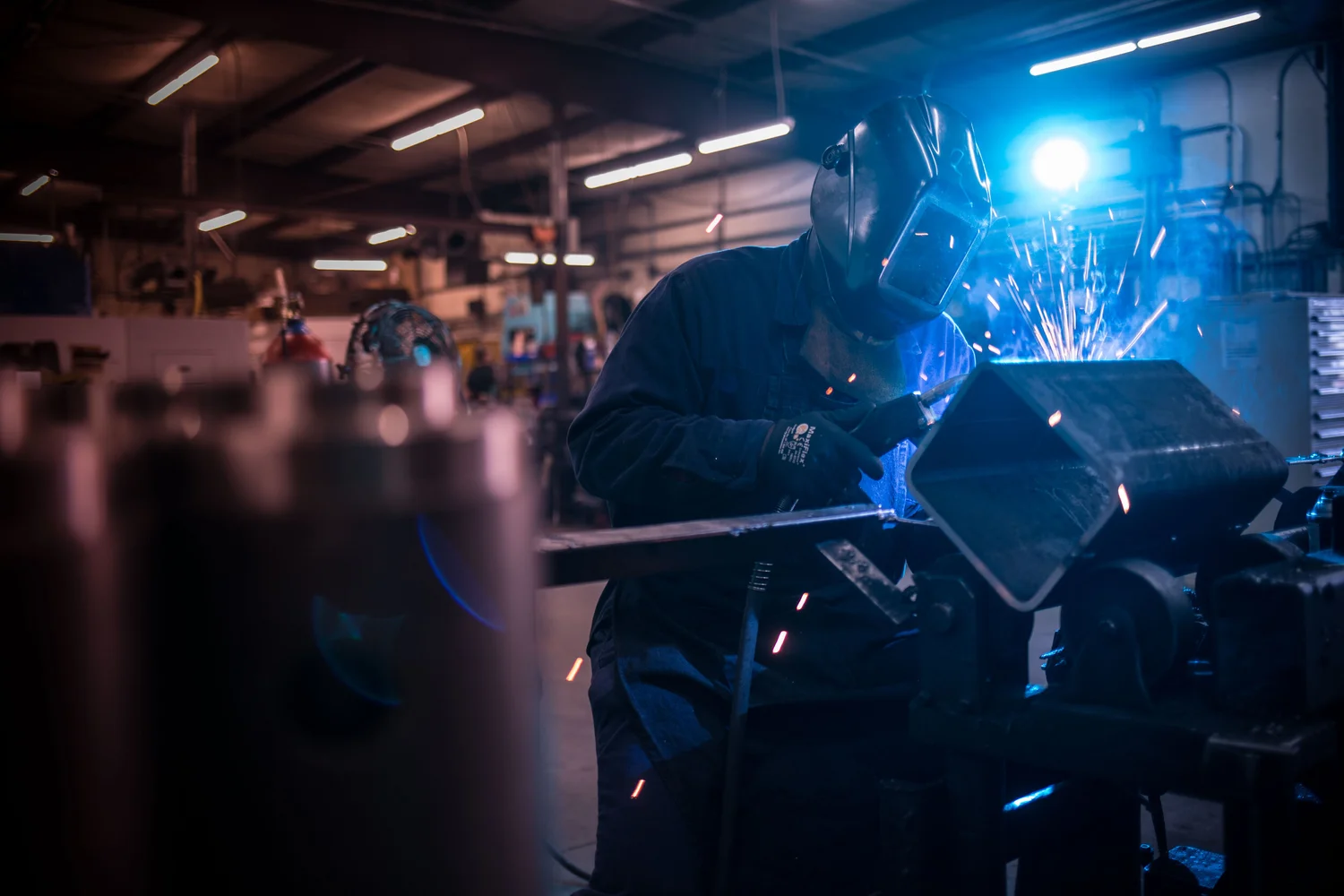 Industrial process illuminated by blue working light