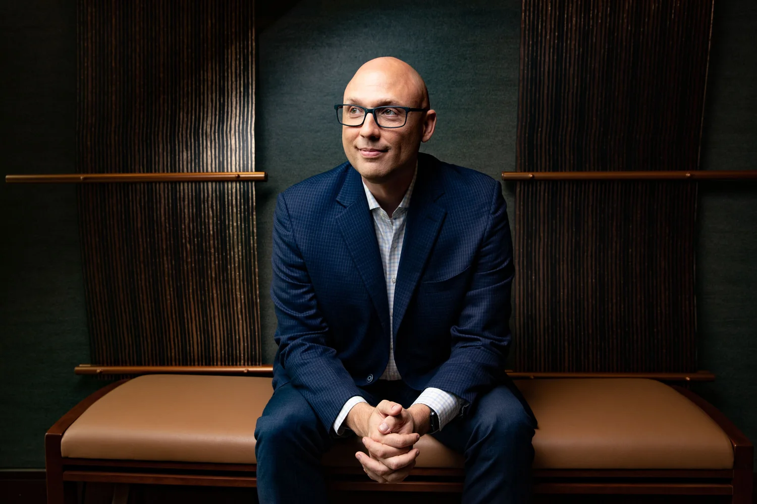 Seated commercial portrait with studio control