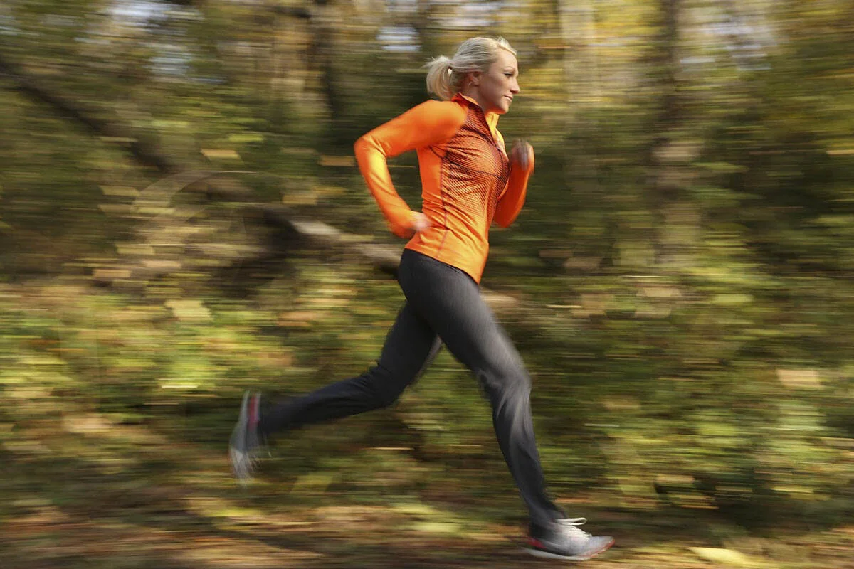 Runner photographed in motion