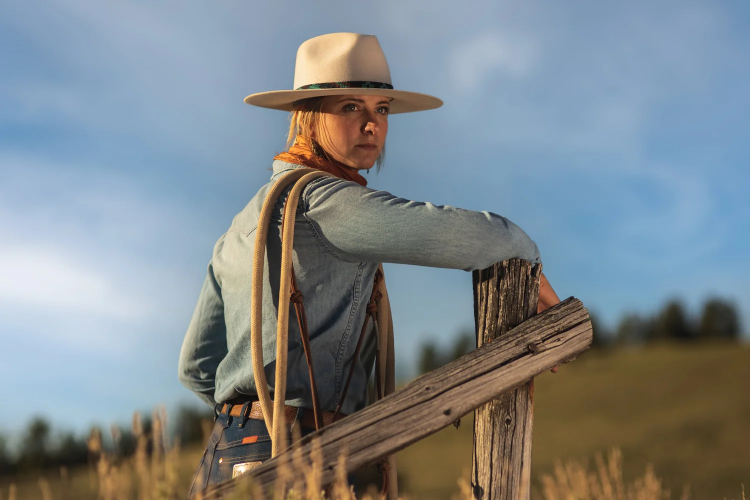 Western portrait at a fence