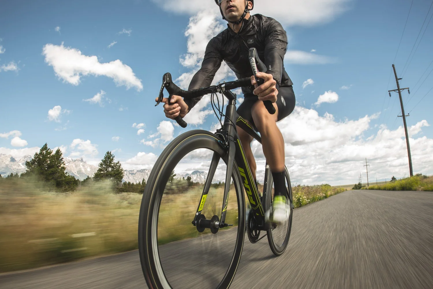Cyclist photographed at speed in a commercial campaign